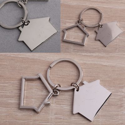 Брелок  Два домика уценка, серебристый-1